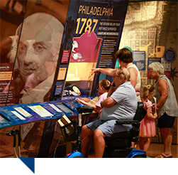 Visitors viewing an exhibit